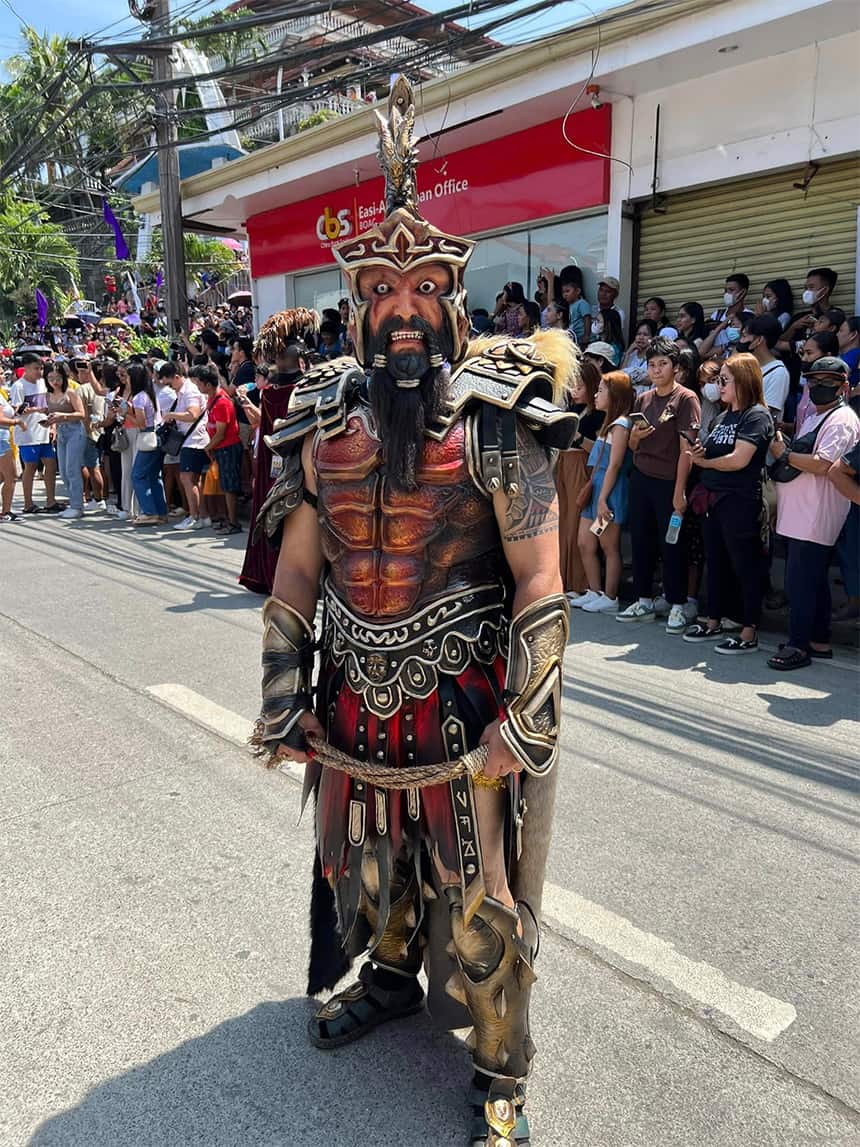 Photo of a participant in a Roman centurion costume and mask.